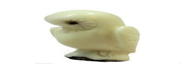 Chouette taillée dans la graine de tagua