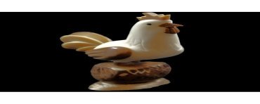 Coq taillé dans la graine de tagua