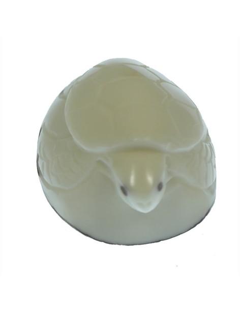 Tortue marine taillée dans la graine de tagua Tortue marine taillée dans la graine de tagua