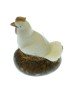 Poule taillée dans la graine de tagua