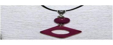 Pendentif design tagua teintée violet 