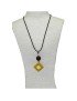 Pendentif design tagua teintée jaune