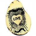 Gravure d\'un Coeur sur une tranche de tagua 