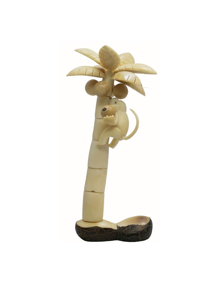 Cocotier et singe taillé dans la graine de tagua