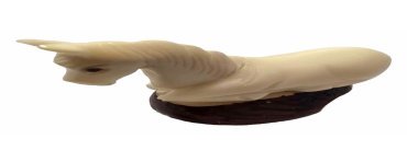 Petit Cheval couché taillé dans la graine de tagua ou ivoire végétal