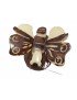 Papillon taillé dans la graine de tagua appelée aussi ivoire végéta