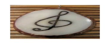 Pendentif tagua clé de sol 